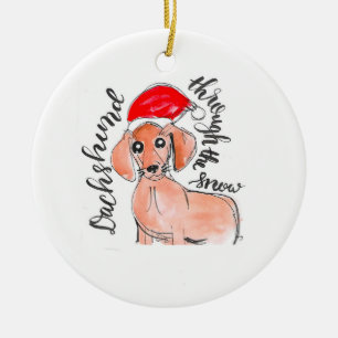 Dackel durch die Schnee-Weihnachtsverzierung Keramikornament