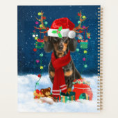 Dackel Hund im Schnee mit Weihnachtsgeschenken Planer (Rückseite)