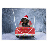 Dackel Hund im Schnee sitzen im Weihnachtswagen Große Geschenktüte (Rückseite)