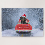Dackel Hund im Schnee sitzen im Weihnachtswagen Puzzle (Horizontal)