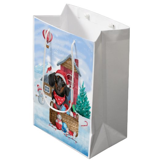 Dackel Hund im Schnee Weihnachtshundehaus Mittlere Geschenktüte (Vorderseite Schrägansicht)