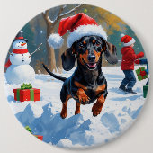 Dackel läuft im Schnee mit Weihnachtshut Button (Vorderseite)