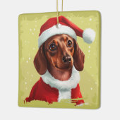 Dackel mit Ausstattung des Weihnachtsmanns - Weihn Keramikornament (Links)
