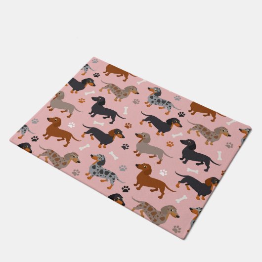 Dackel-Paare und Knochenmuster Pink Fußmatte (Schrägansicht)