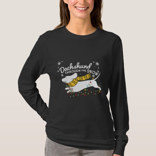 Dackel strahlt durch den Schnee T-Shirt (Vorderseite)