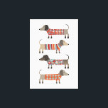 Dackel Wursthund Leinwanddruck<br><div class="desc">Niedliche kleine Dackel Würstchen oder Dackel Hunde in Wollstrickbekleidung. Ideal für Hundeliebhaber und Hundeschlittengänger.</div>