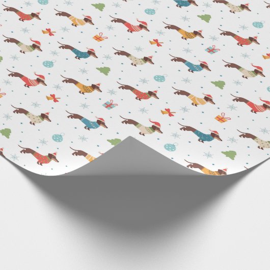 Dackeln im Weihnachtssüßmuster Geschenkpapier (Ecke)