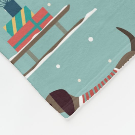 Dackeln mit Geschenken und Schlitten Muster Fleecedecke (Ecke)