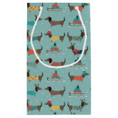Dackeln mit Geschenken und Schlitten Muster Kleine Geschenktüte (Rückseite)