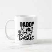 Daddy ist meine Bestie, eine Spezialanleihe mit de Kaffeetasse (Links)