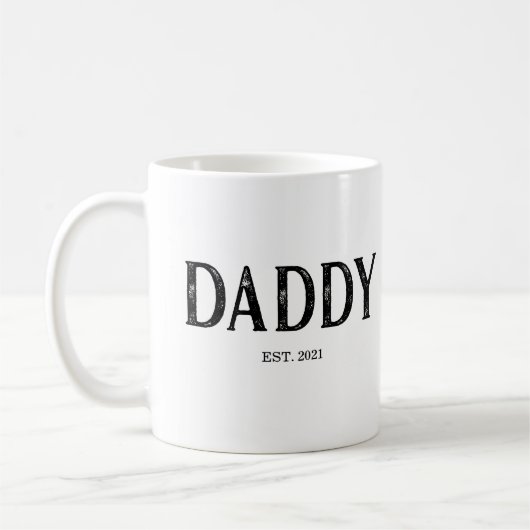 Daddy Year etabliert Kaffeetasse (Links)