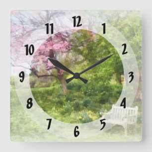 Daffodils by Bench Quadratische Wanduhr