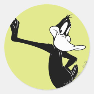 DAFFY DUCK™, das gegen eine Wand gelenkt wird Runder Aufkleber