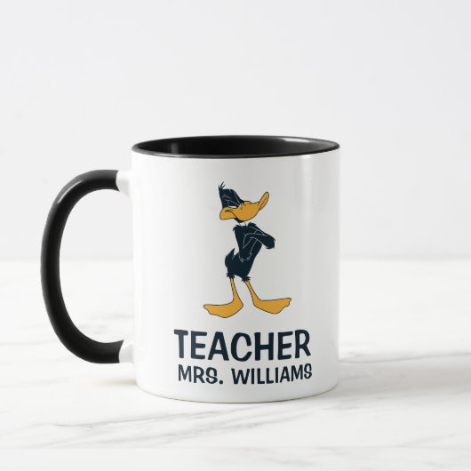 DAFFY DUCK™ mit überfülltem Waffenlehrer Tasse (Links)