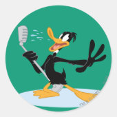 DAFFY DUCK™ Singing Runder Aufkleber (Vorderseite)