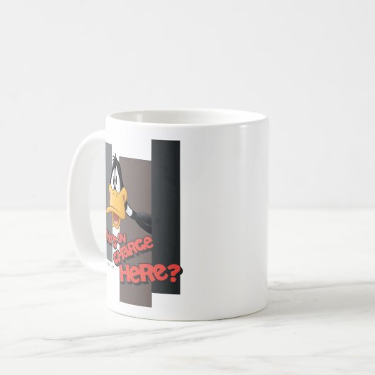 DAFFY DUCK™ "Wer ist hier verantwortlich?" Kaffeetasse (Vorderseite Links)