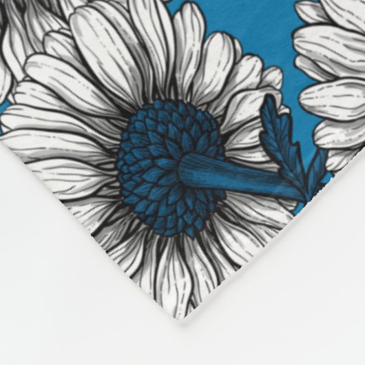 Daisies on blue fleecedecke (Ecke)