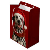 Dalmatian in a santa hat Christmas gift bag Mittlere Geschenktüte (Rückseite Schrägansicht)