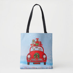 Dalmatiner im Auto mit dem Weihnachtsmann Tasche