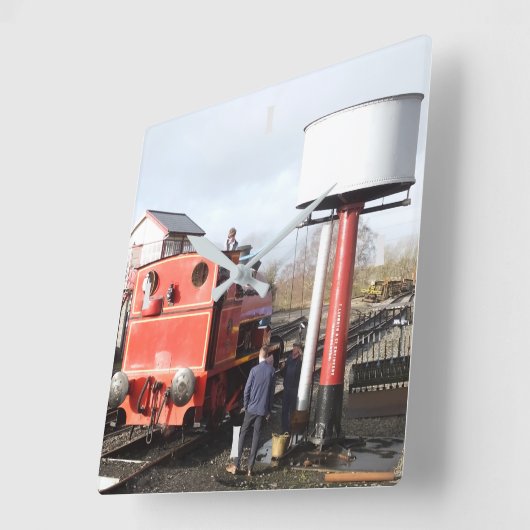 DAMTRAG QUADRATISCHE WANDUHR (Winkel)