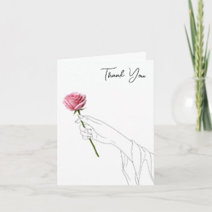 Danke-Hand hält eine rosa Rose Karte