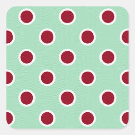Dark Red Polka Dots auf blassgrün Quadratischer Aufkleber