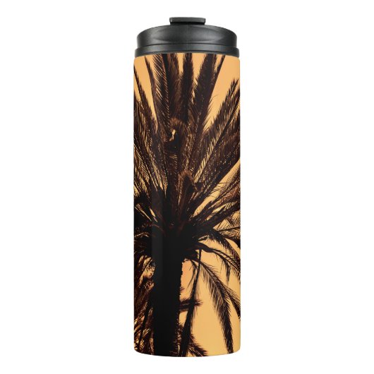 Dark silhouettes of date palms against bright colo thermosbecher (Vorderseite)