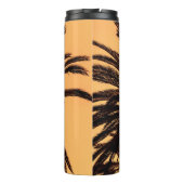 Dark silhouettes of date palms against bright colo thermosbecher (Rückseite)