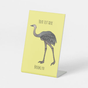 Darstellung eines größeren Rhea-Cartoon Sockelschild