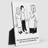 Dartboard im Schlafzimmer. Funny Cartoon Fotoplatte (Seite)