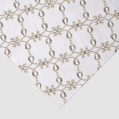 Das aufwändige Design der Metallschleife aus dem 1 Seidenpapier (Ausschnitt)