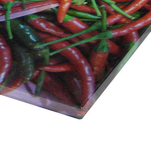 Das Augen-Chili-Paprikaschoten des Vogels Schneidebrett (Ecke)