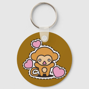 Das ausgestopfte Spielzeug des Affen Schlüsselanhänger