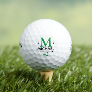 Das benutzerdefinierte grüne Monogramm des Golfspi Golfball