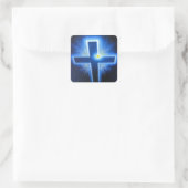 Das blaue hinterleuchtete Kreuz. Quadratischer Aufkleber (Tasche)