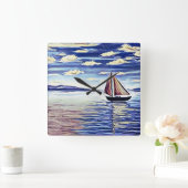 Das Boot bewegt sich von der Küste weg Quadratische Wanduhr (Zuhause)