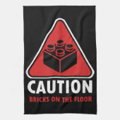 Das Gebäude "Funny Warning Caution" blockiert Stei Geschirrtuch (Vertikal)