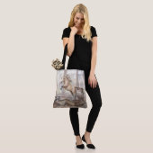 Das gelehrte Pferd springt aus einem Buch Tasche (Am Model)