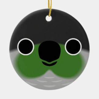 Das Gesicht eines grünen Wangenparakets Keramik Ornament