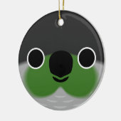 Das Gesicht eines grünen Wangenparakets Keramik Ornament (Links)