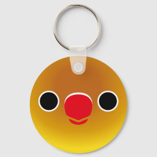 Das Gesicht eines pastellgrünen Maskenvogels Schlüsselanhänger