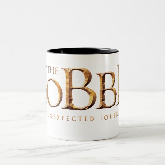 Das Hobbit-Logo ist texturiert Zweifarbige Tasse (Mittel)