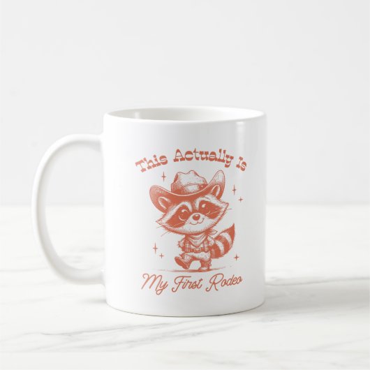 Das ist tatsächlich mein erster Rodeo Raccoon Cowb Kaffeetasse (Links)