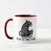 Das Jahr der Tiger-Kürzung in chinesischem Papier Tasse (Links)