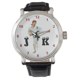 Das Karate, das schwarzen Gürtel tritt, fertigen Armbanduhr