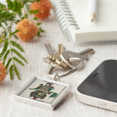 Das Kostüm des Parfümerzeugers Schlüsselanhänger (Seite)