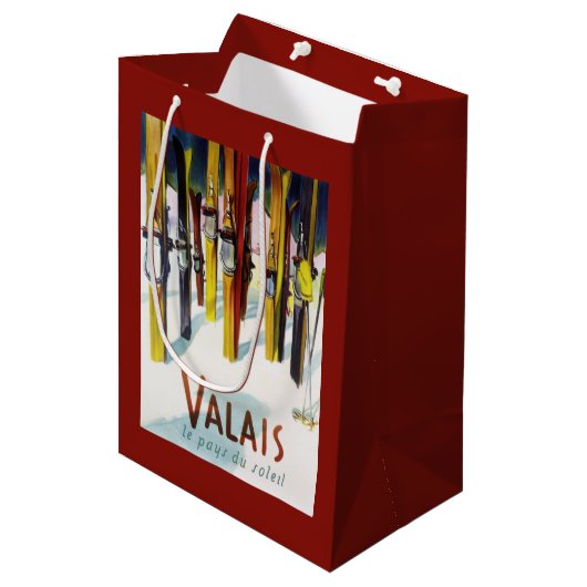 Das Land des Sonnenscheins - Skis stehend im Mittlere Geschenktüte (Vorderseite Schrägansicht)