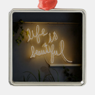 Das Leben ist wunderschön. Ornament Aus Metall