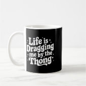 Das Leben zieht mich am Slip Kaffeetasse (Links)