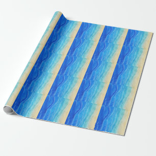 Das Meer und der Strand sind in Aquarellen gehalte Geschenkpapier